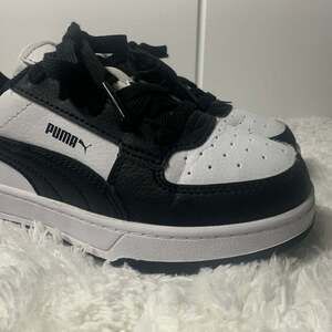 PUMA Caven Sneaker, White Black Black, 13C US Unisex Big Kid